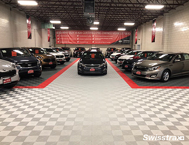 Kia dealership installed with red, white,and b