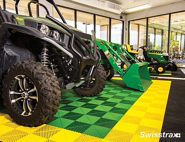 Outdoor vehicle showroom using interlocking floor tiles from Swisstrax