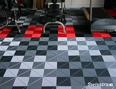 Large garage gym with Ribtrax Pro tiles installed