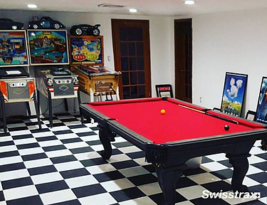 Checkered flooring pattern in man cave game room