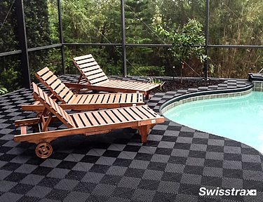 Beach chairs sitting ontop of interlocking floor tiles from Swisstrax